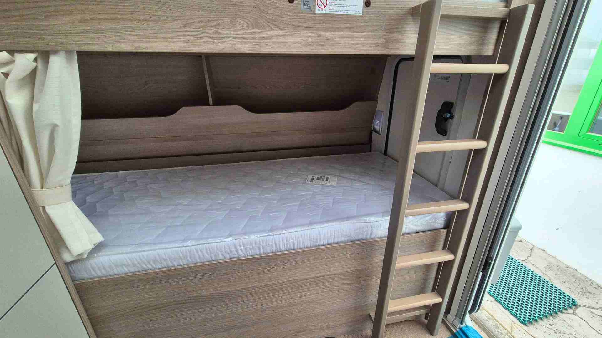 litera de abajo caravana